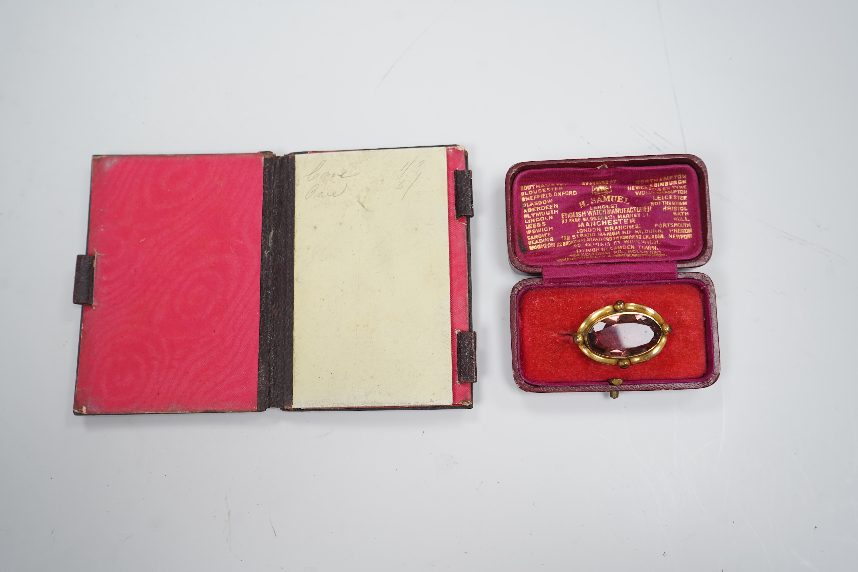 A group of costume jewellery and collector's items in a Japanese lacquer box